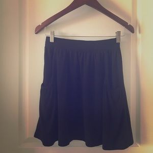 Black skirt with front pockets